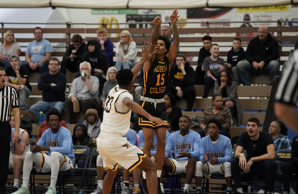 WATCH: Manchester University Hangs on For Road Win at Adrian College